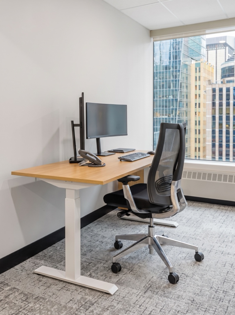 Height-adjustable desk and task chair